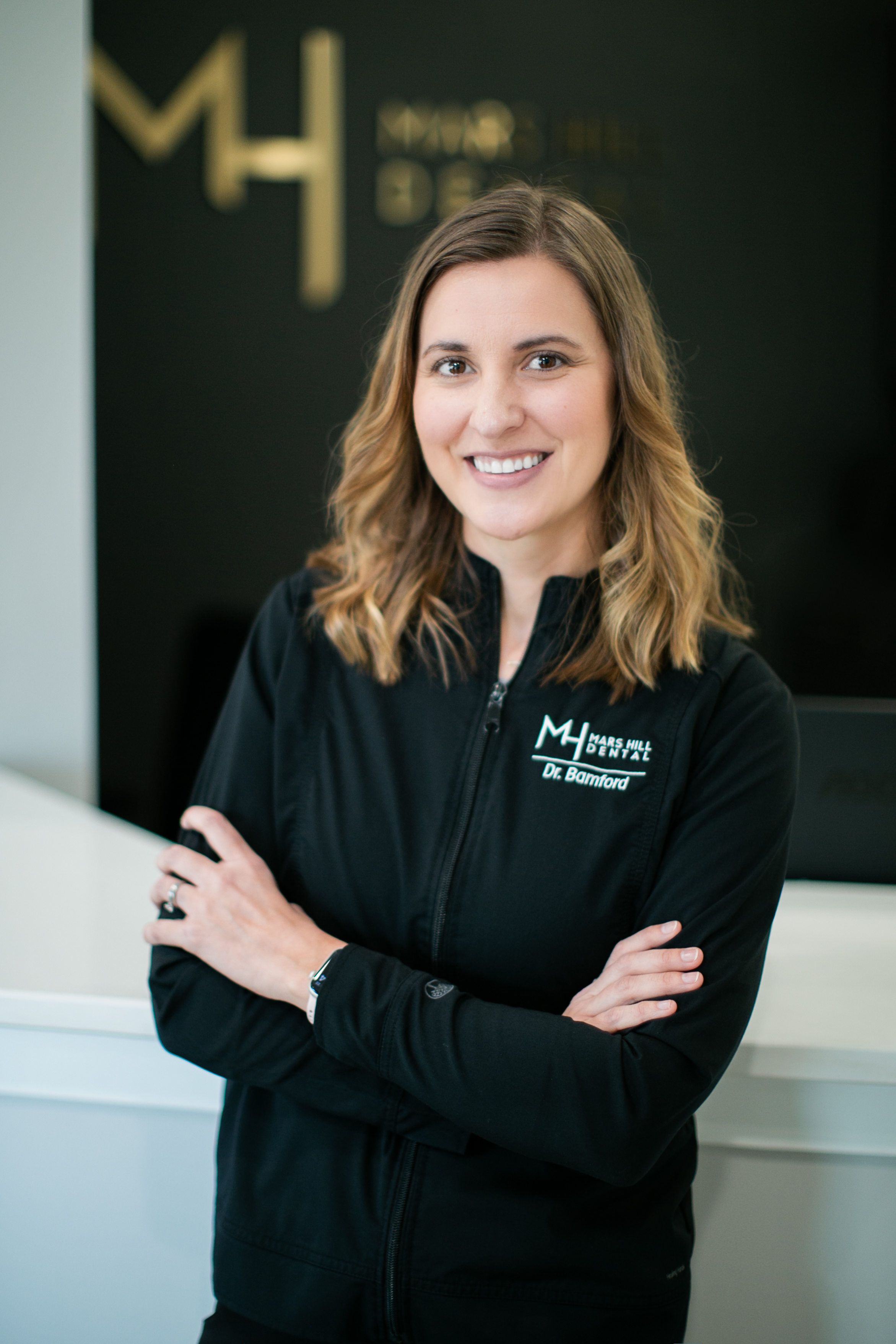 Dr. Bamford at the reception desk